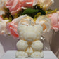 Bougie ourson fait main, disponible en plusieurs tailles, sans CMR ni phtalates, pour une ambiance douce et saine.