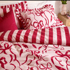 Parure de lit réversible rose poudré – Motif nœuds et rayures rouges et roses – Plusieurs dimensions - PRÉCOMMANDE